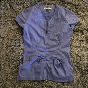 Koi top. Color ceil blue. Size XS.